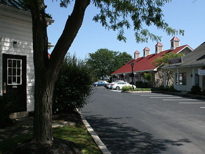 buildings with parking spaces in front